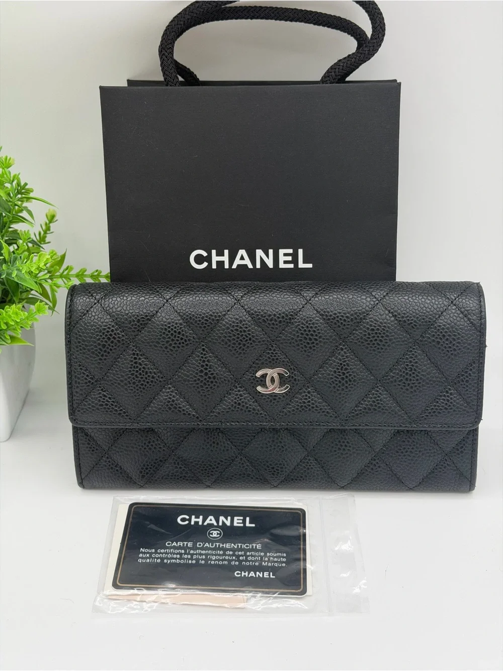 CHANEL Black Quilted Classic Flap Wallet Caviar skin with silver CC Logo😍